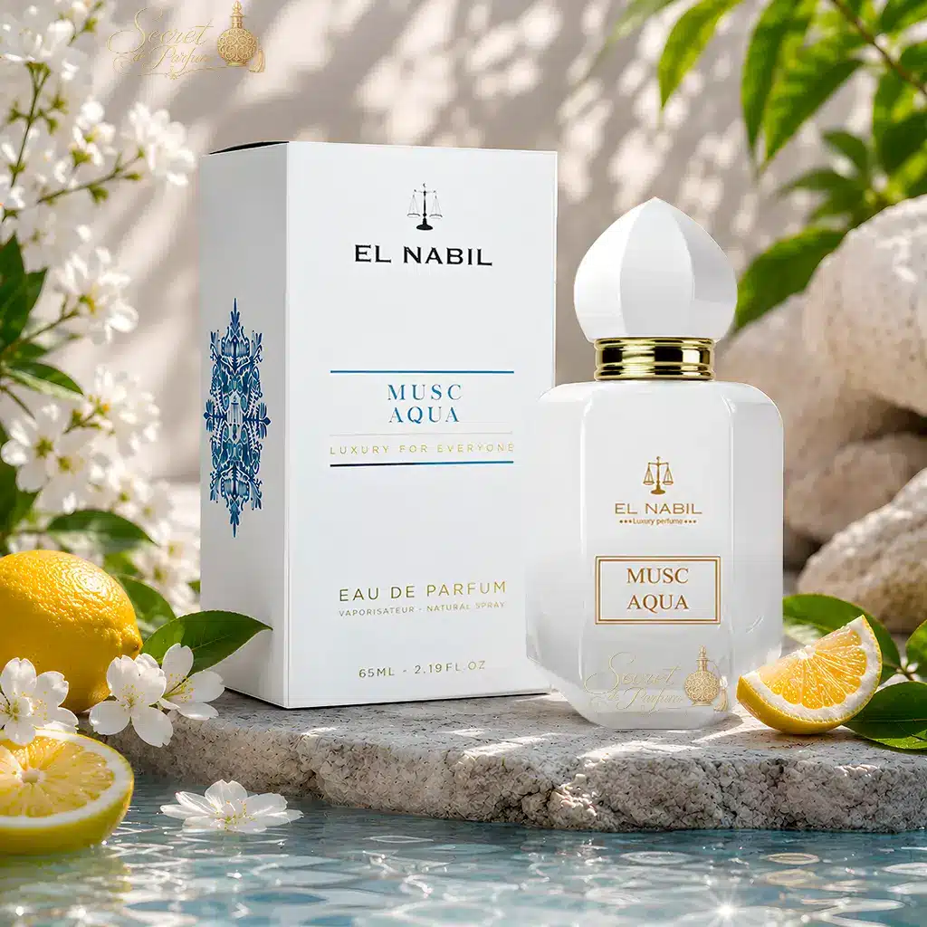 Musc Aqua – Eau de Parfum Mixte 65 ml | El Nabil 3 Parfum Musc Aqua d'El Nabil avec son coffret dans une mise en scène fraîche aux agrumes.